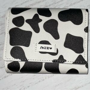 Cow Print Tri-Fold wallet with optional personalization on the‎ inside
